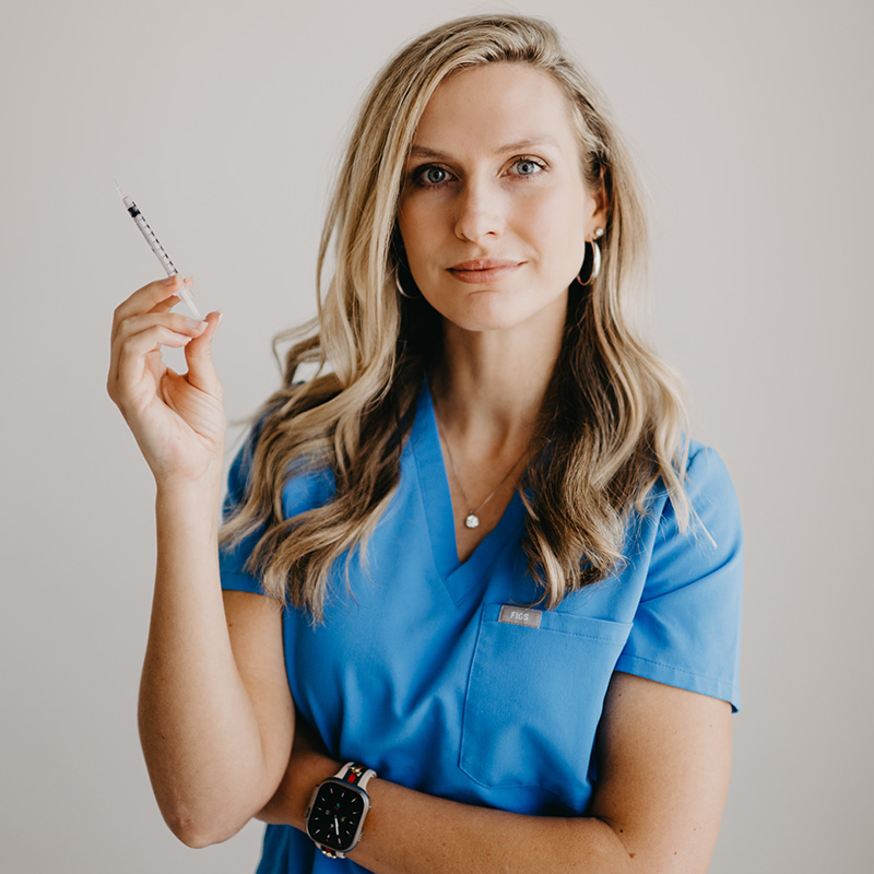 Aesthetics Doctor with Needle in Hand